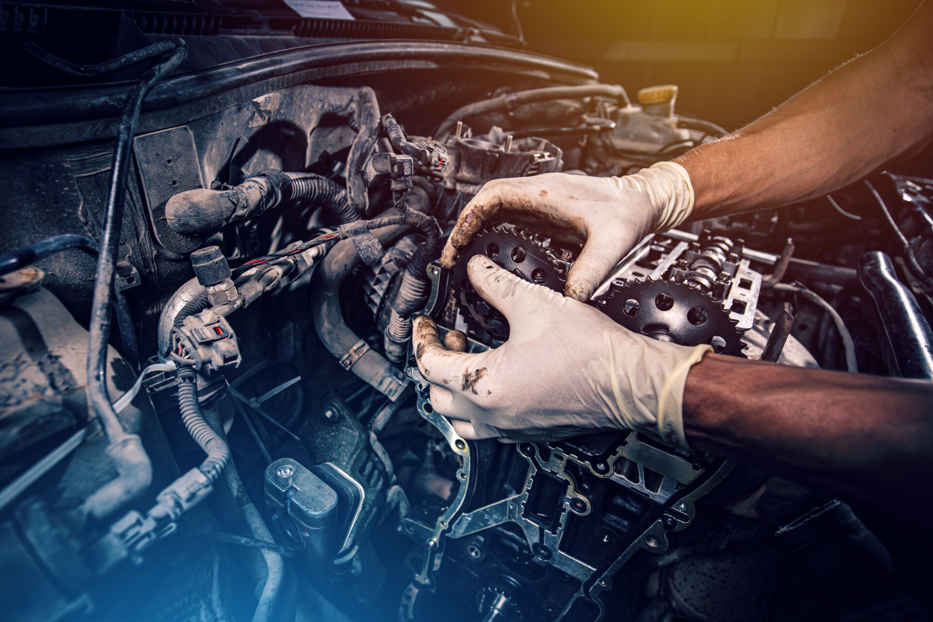 Car repair and maintenance composition. Mechanic working with car engine